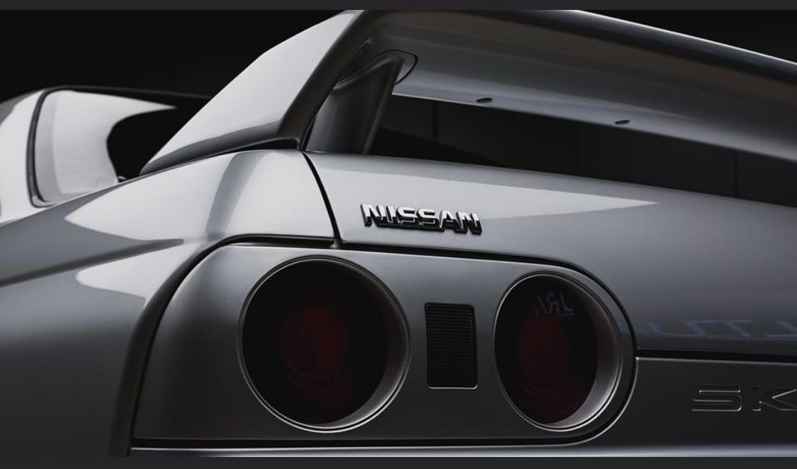 a close up of a black car when ceramic coating has been applied