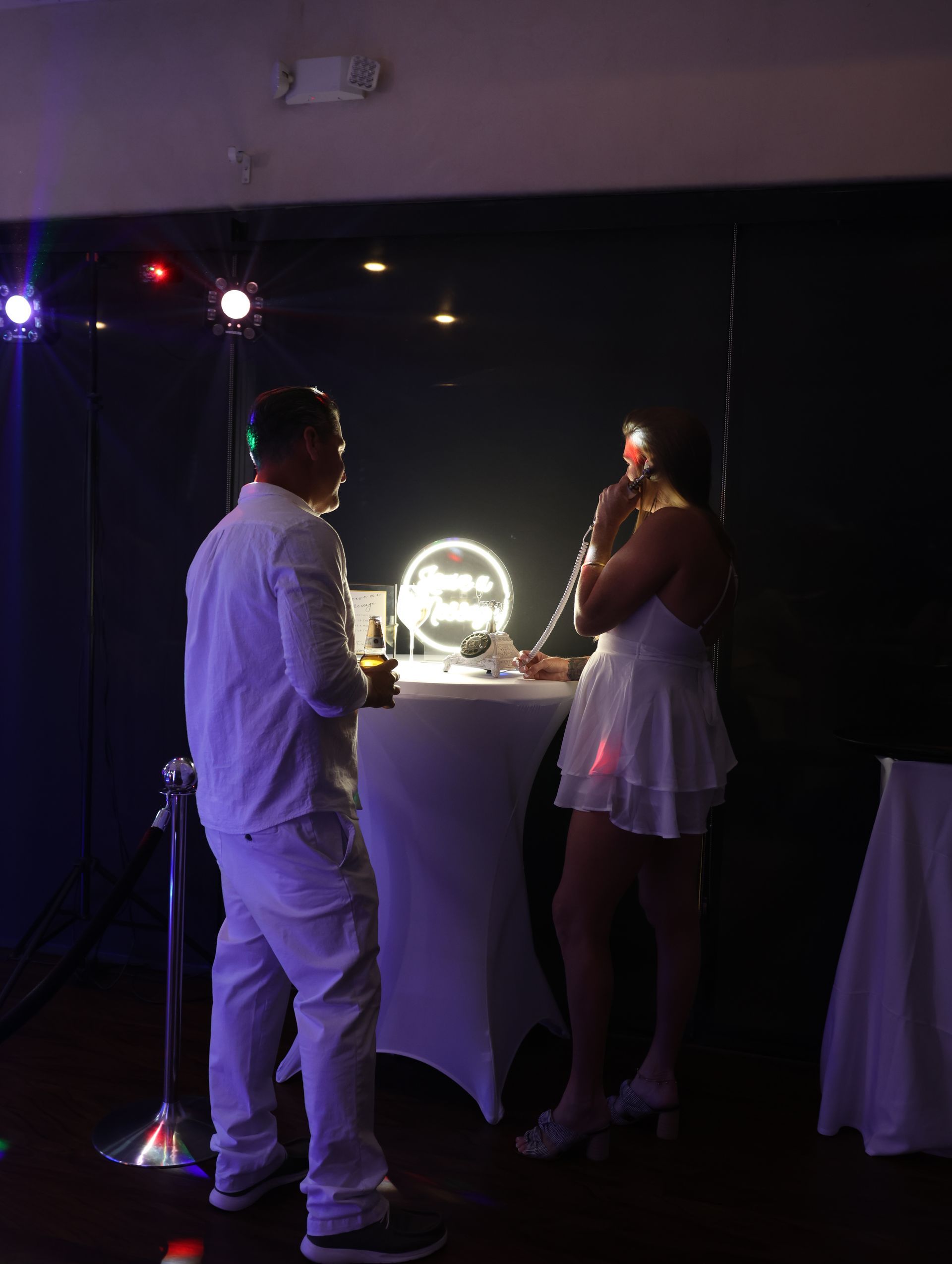 Couple using audio guestbook at Washington, DC wedding with IS Photobooth