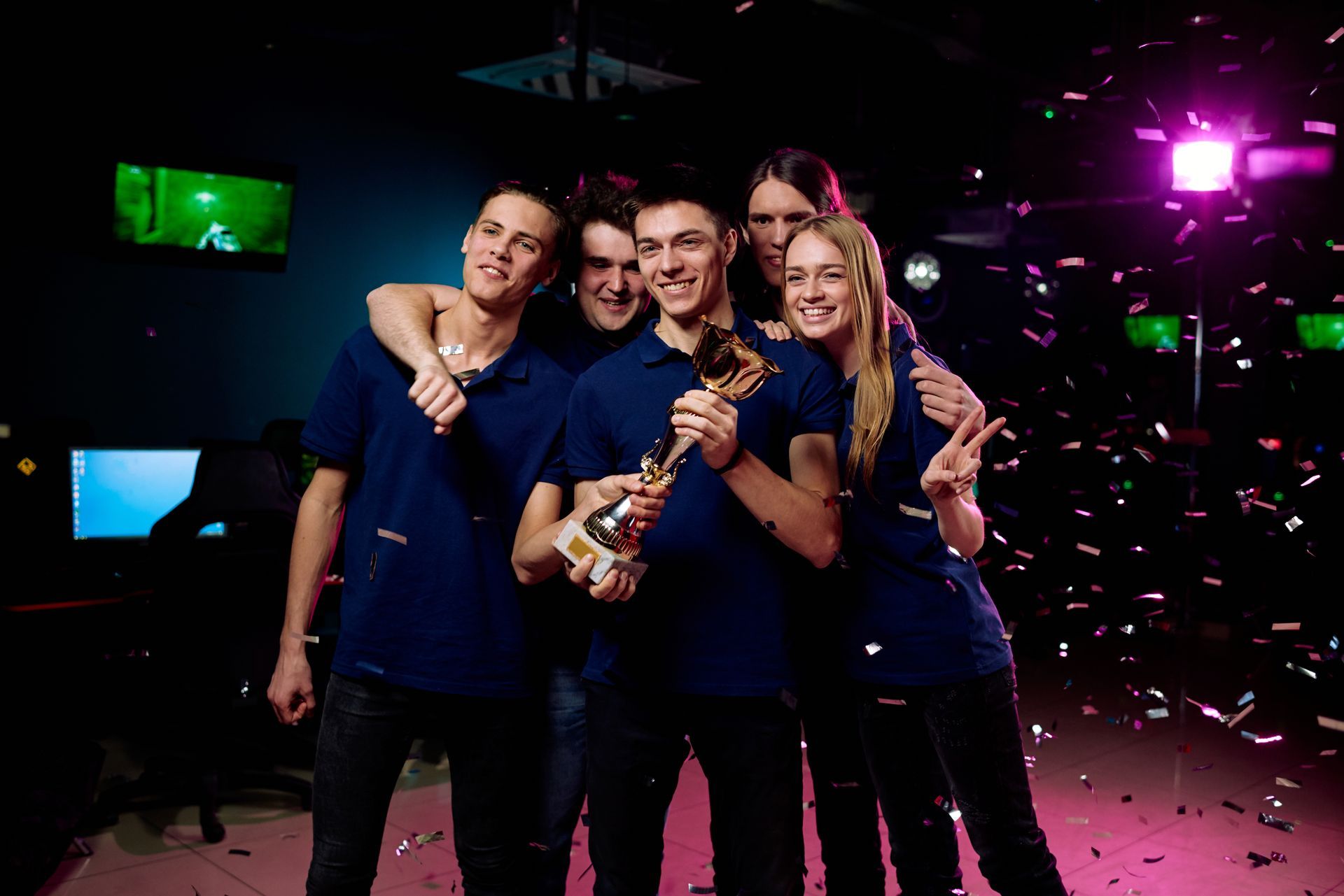 Team or group of 5 posing with trophy for IS Photobooth picture