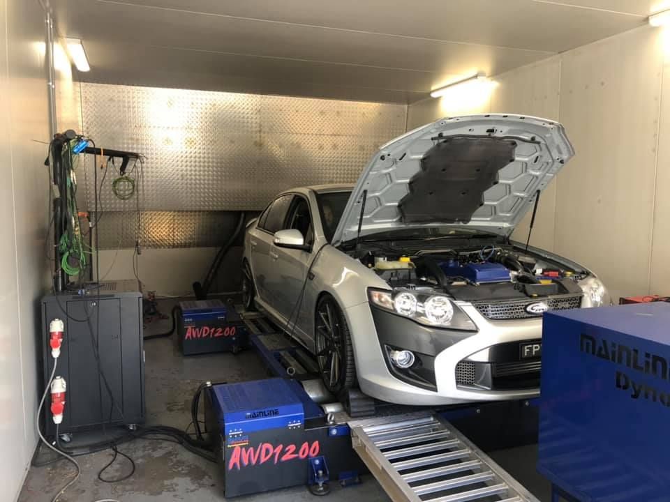 Car is Being Tuned in a Garage With the Hood Open — Ulladulla, NSW — B & D Automotive Repairs