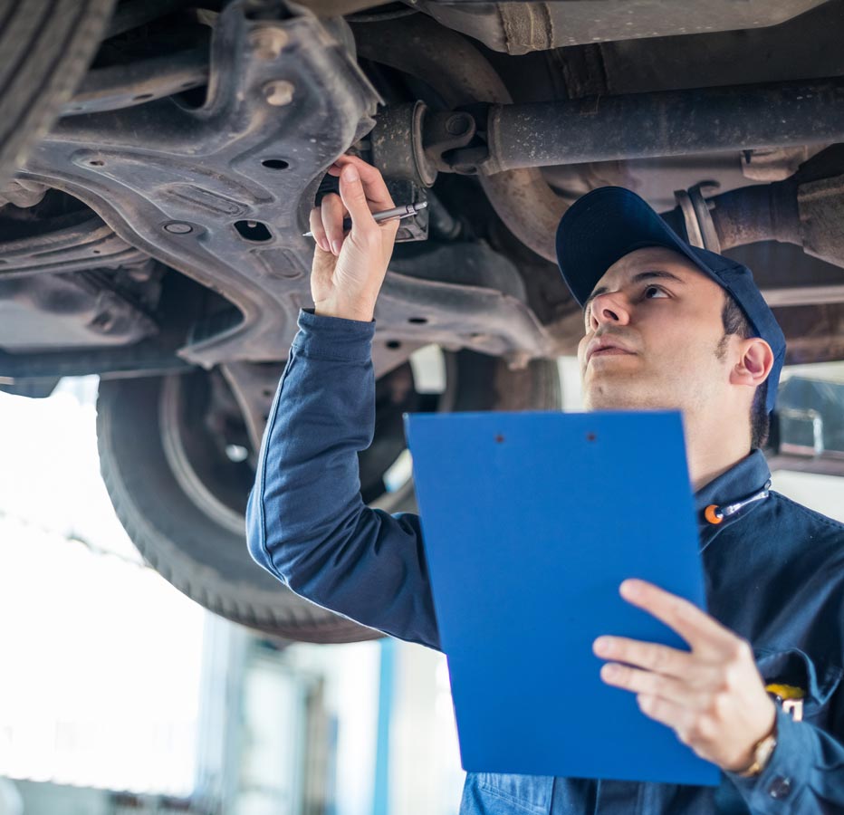 Inspecting Under The Car — TR Motors in Coolum Beach, QLD