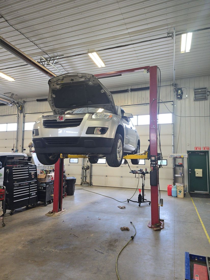 Mechanic discussing vehicle assessment with customer