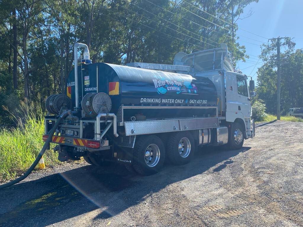 Blue Septic Tank Truck Parked on a Gravel Road — Water TopUps Gympie in Pie Creek, QLD