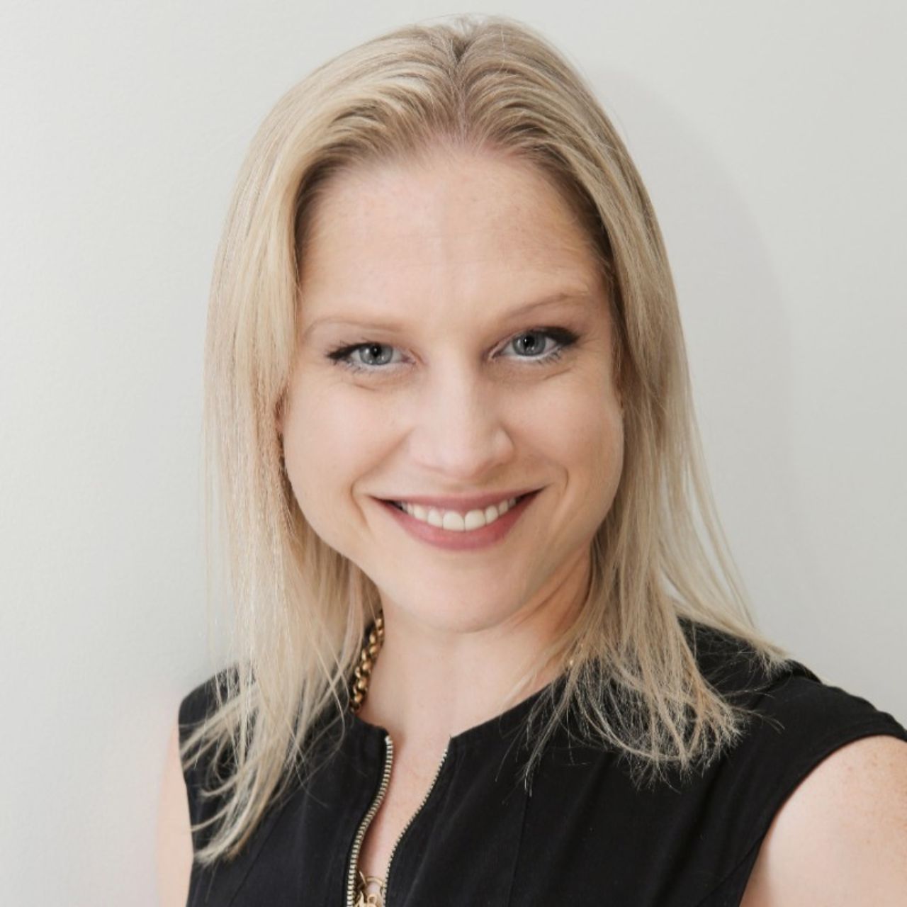 Lovely Pershouse from Pro-Lift Training FNQ - a woman with blonde hair is smiling and wearing a black shirt