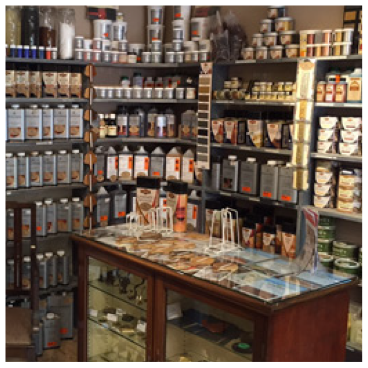 A store filled with lots of bottles and shelves