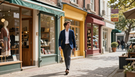 Entrepreneur walking through storefront