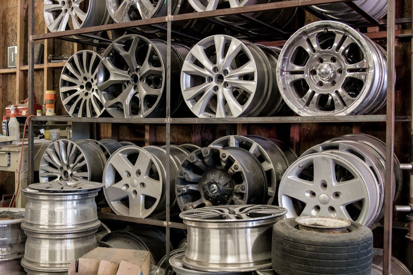 A warehouse filled with lots of wheels and tires.