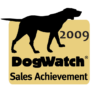 A black silhouette of a dog on a tan background with the text 