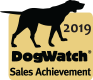 A gold-colored square emblem featuring a black silhouette of a dog above the text 