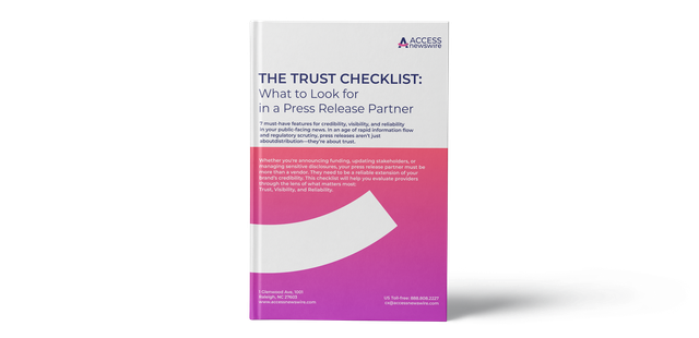 Book cover with white top and pink lower half titled “The Trust Dilemma”