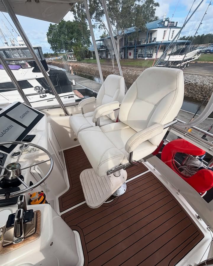 Boat Cockpit Interior With White Captain's Chairs — Master Metals Fabrication in Labrador, QLD