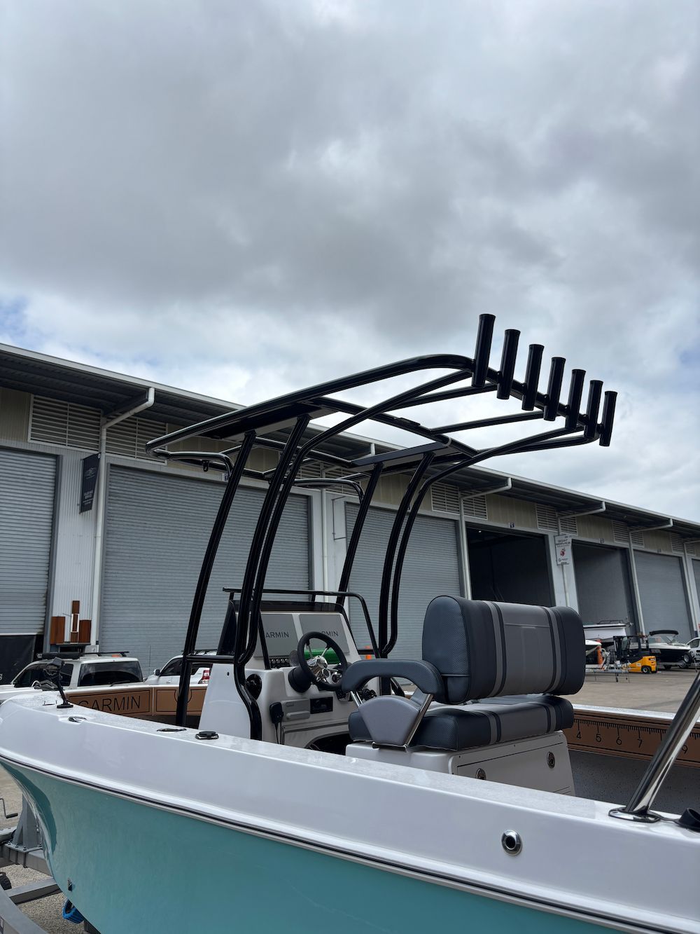 Aluminum Boat With a Metal Sunshade and Fishing Rod Holders — Master Metals Fabrication in Labrador, QLD