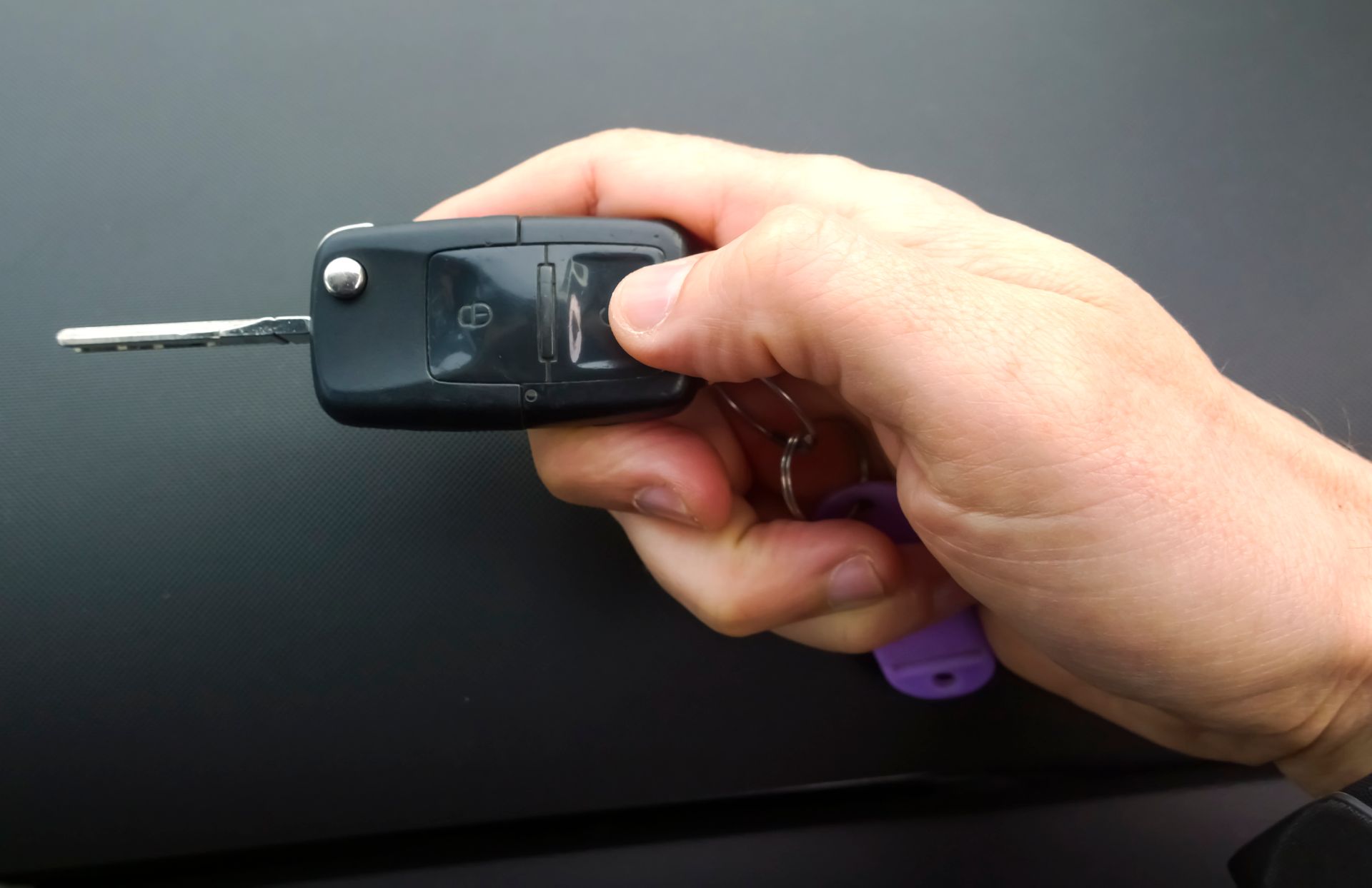 Hand Holding A Car Key — Kingston, TAS — Kingston Locksmiths