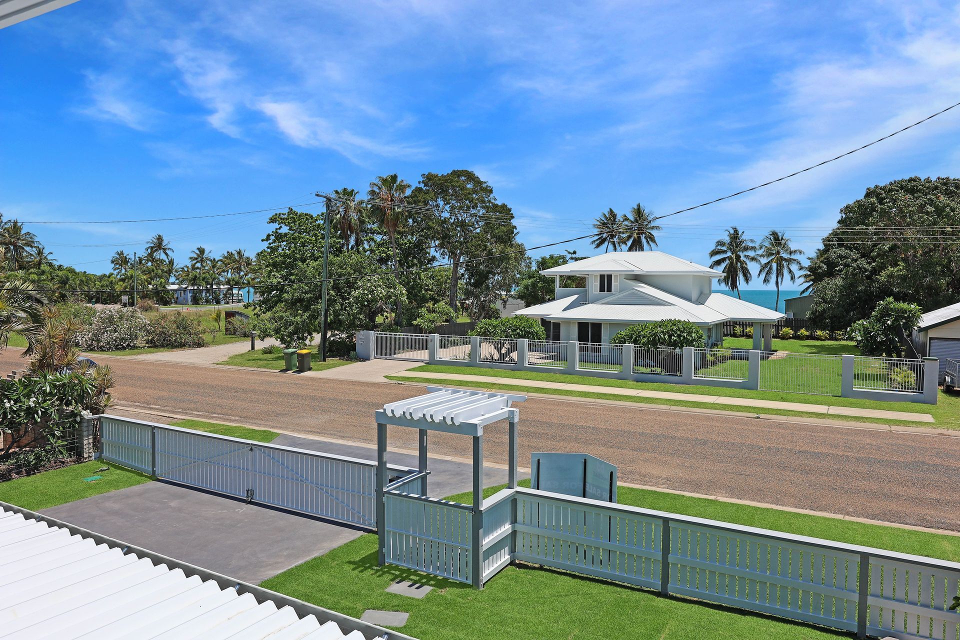Man On A Ladder Painting — Experienced Builder in Collinsville, QLD