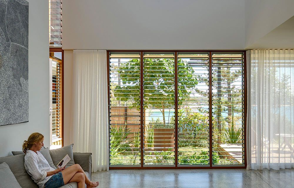Glass And Aluminium Window With Wooden Frame For Your Home — Experienced Builder in Bowen, QLD