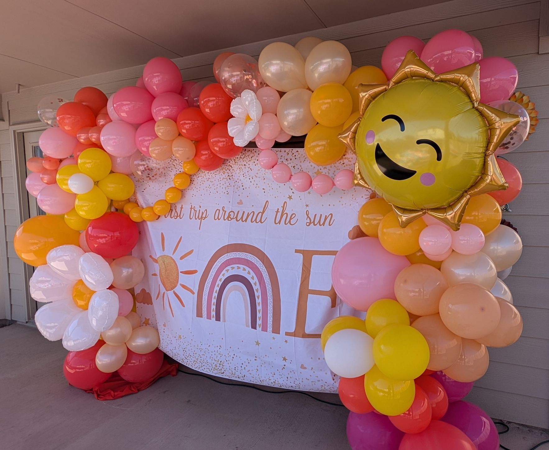 Balloons frame a