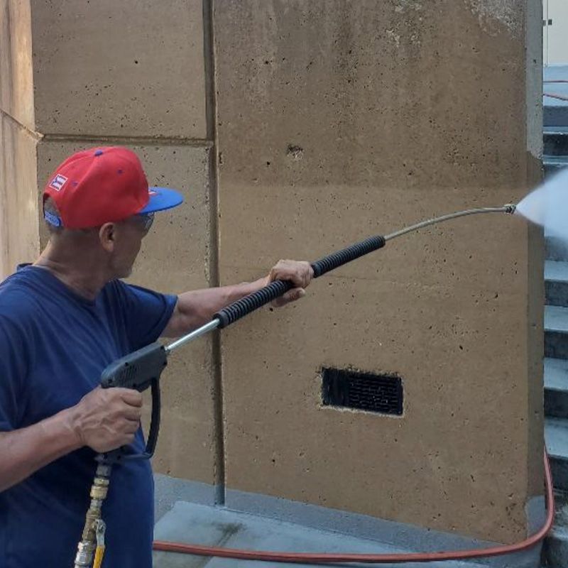 Retaining Wall being cleaned with pressure washer