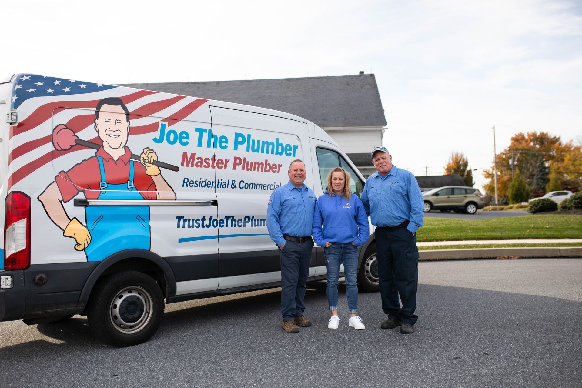 Joe the Plumber team in front of service van at Eden Road office 