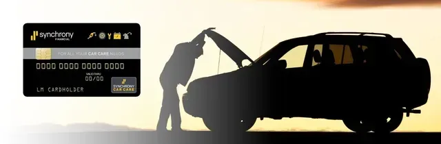Silhouette of a person refueling a black SUV beside a petrol card graphic