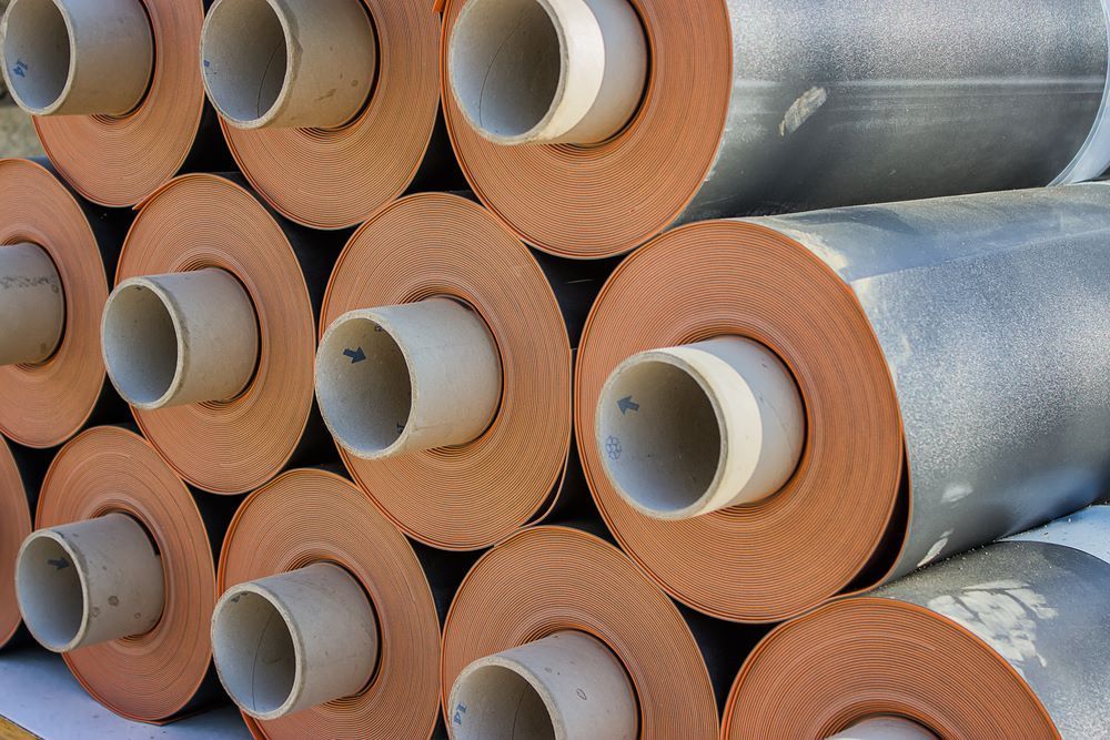 A Bunch of Pipes Are Stacked on Top of Each Other — Border Bolts & Fasteners in Tweed Heads South, NSW