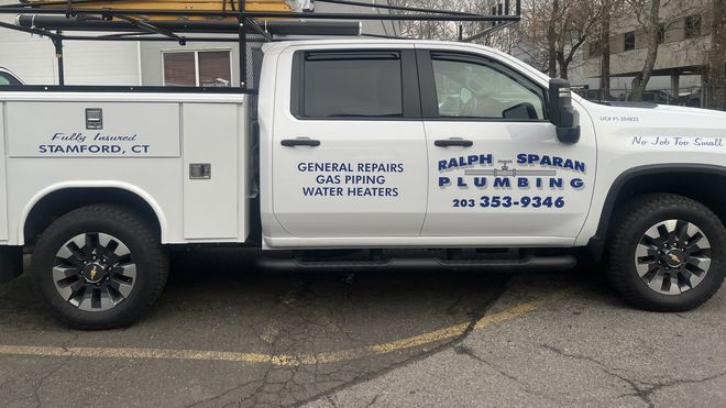 Plumber Repairing Sink — Kitchen Remodeling in Stamford, CT Plumber Repairing Sink — Kitchen Remodeling in Stamford, CT