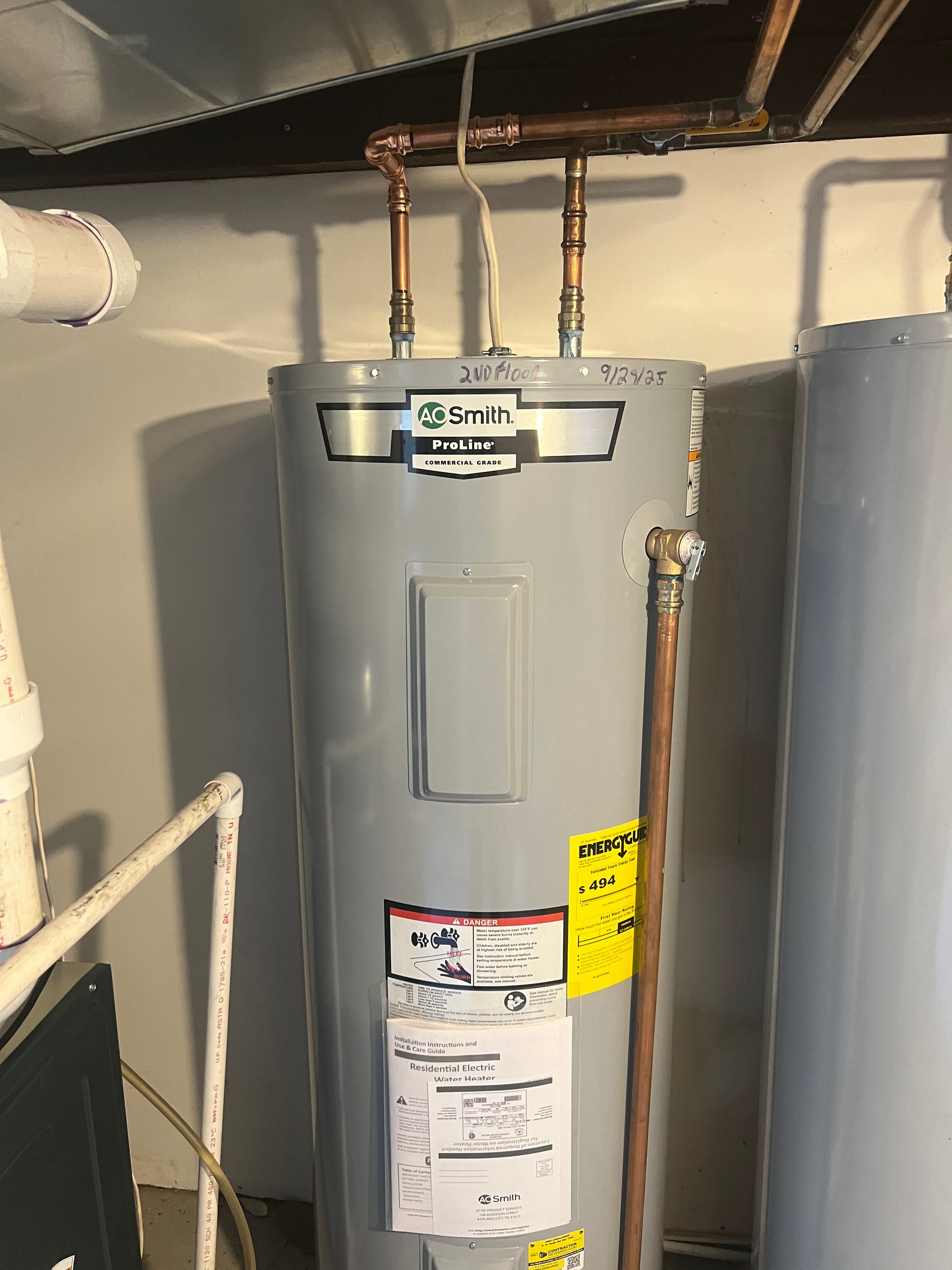 Plumber Repairing Sink — Kitchen Remodeling in Stamford, CT