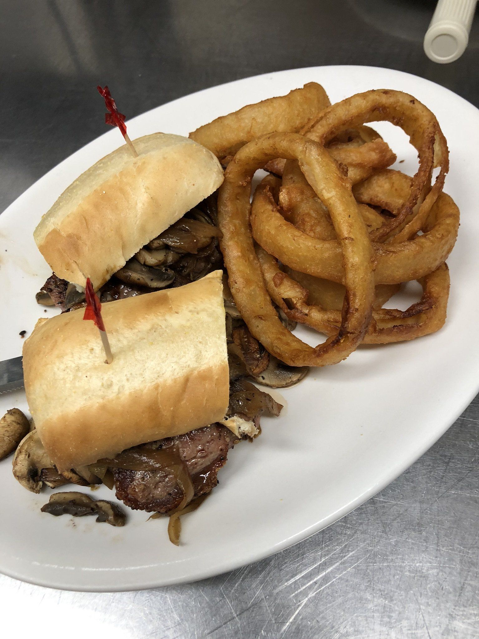 Steak sandwich and crispy onion rings
