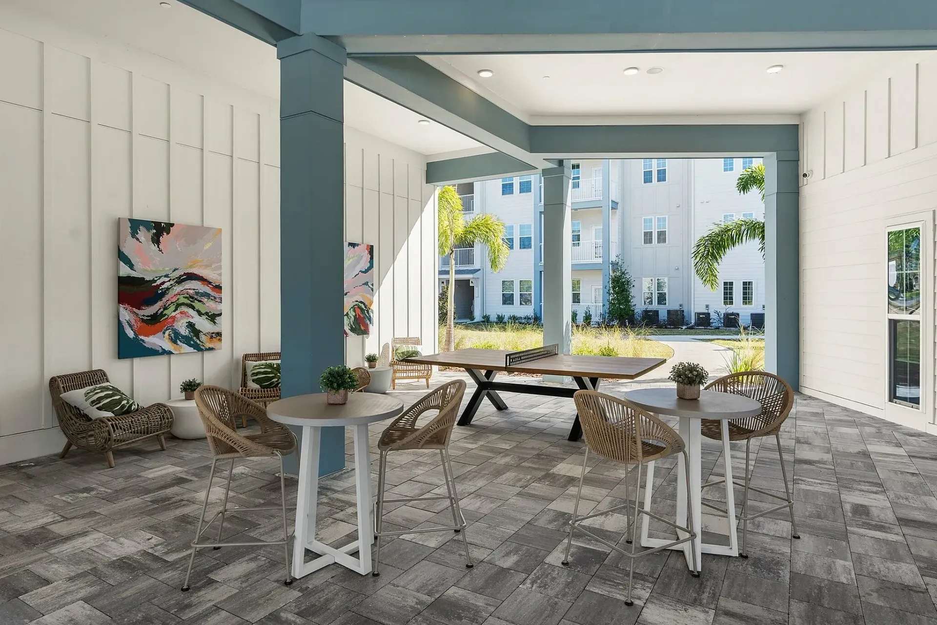 Relax in style with this chic outdoor lounge, a perfect blend of modern design and natural beauty.