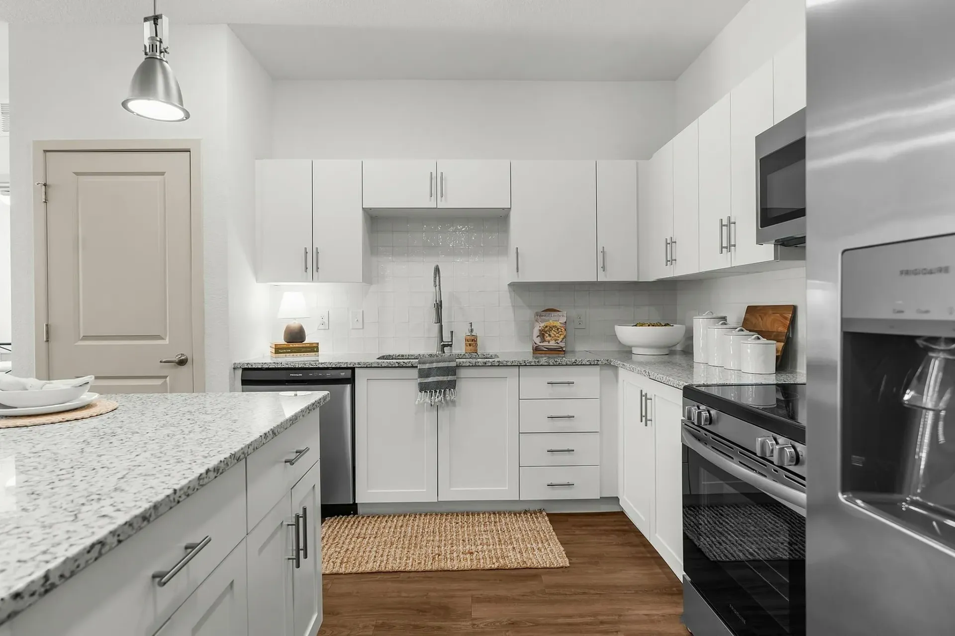 Experience the elegance and functionality of this modern kitchen design.