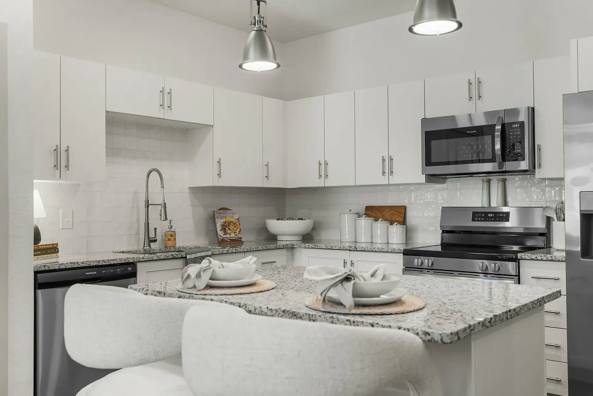 Experience the elegance of this sleek modern kitchen, perfect for culinary enthusiasts.