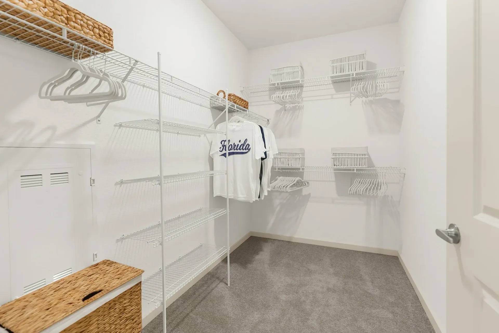 Explore this spacious walk-in closet designed for optimal organization.