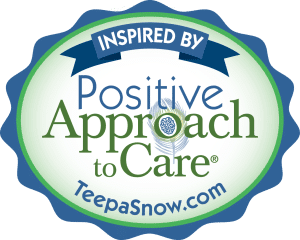 Logo: blue and green seal,