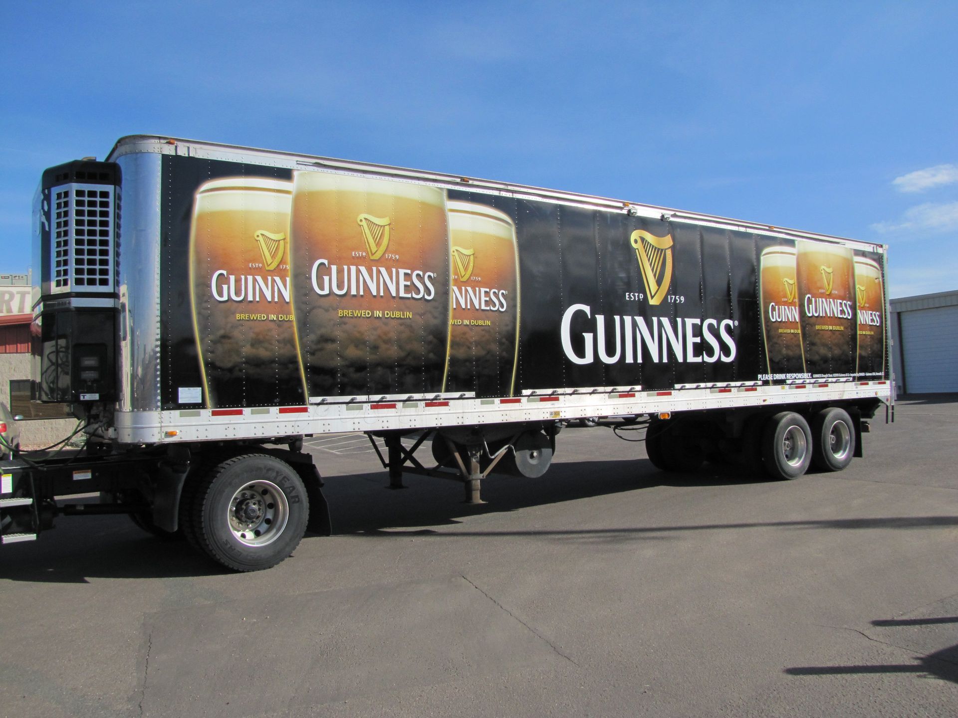 Guinness Beer Full black semi trailer wrap Denver colorado