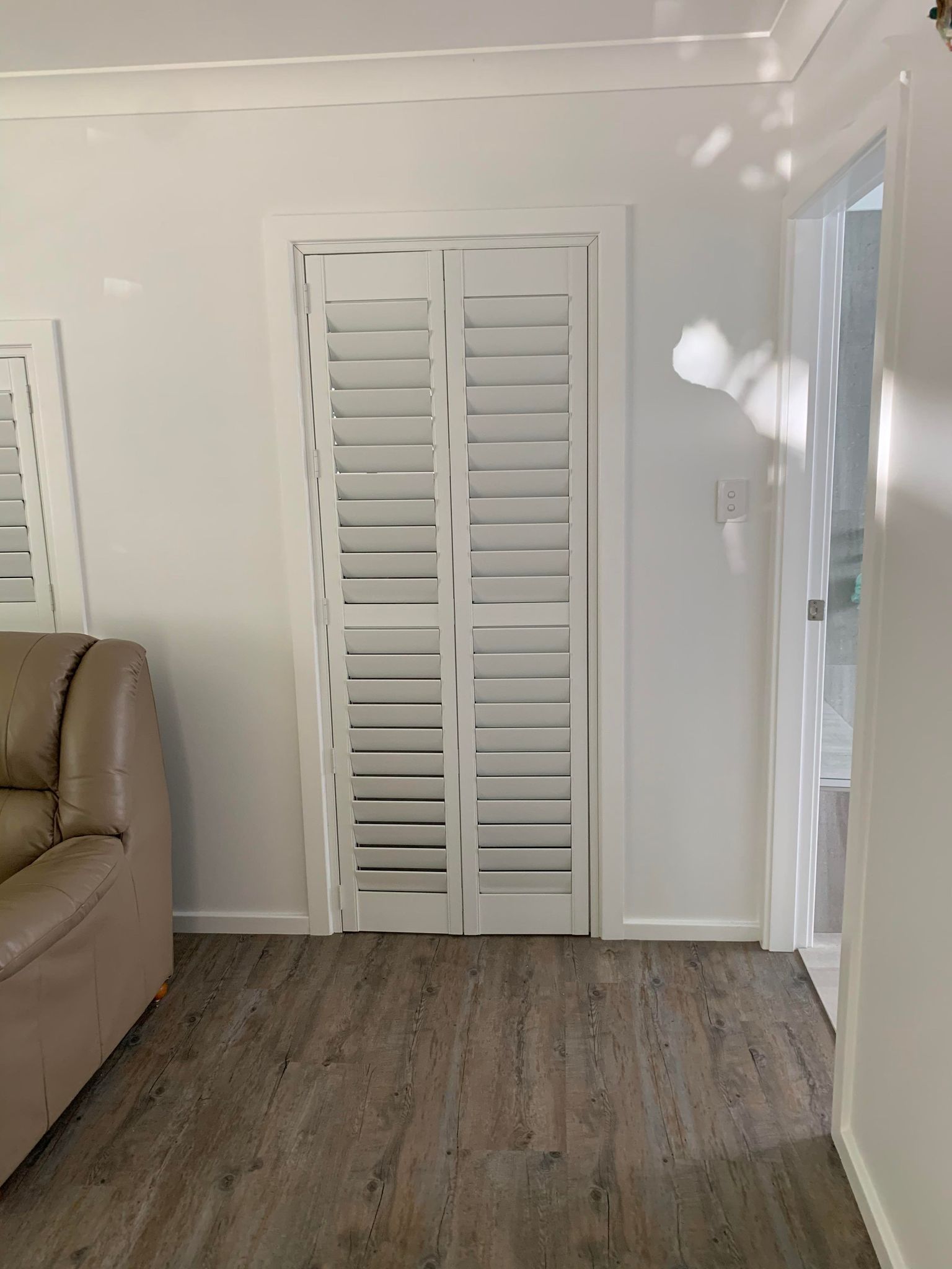 White Shutter Doors - Blinds, Awnings & Shutters in Mid North Coast, NSW