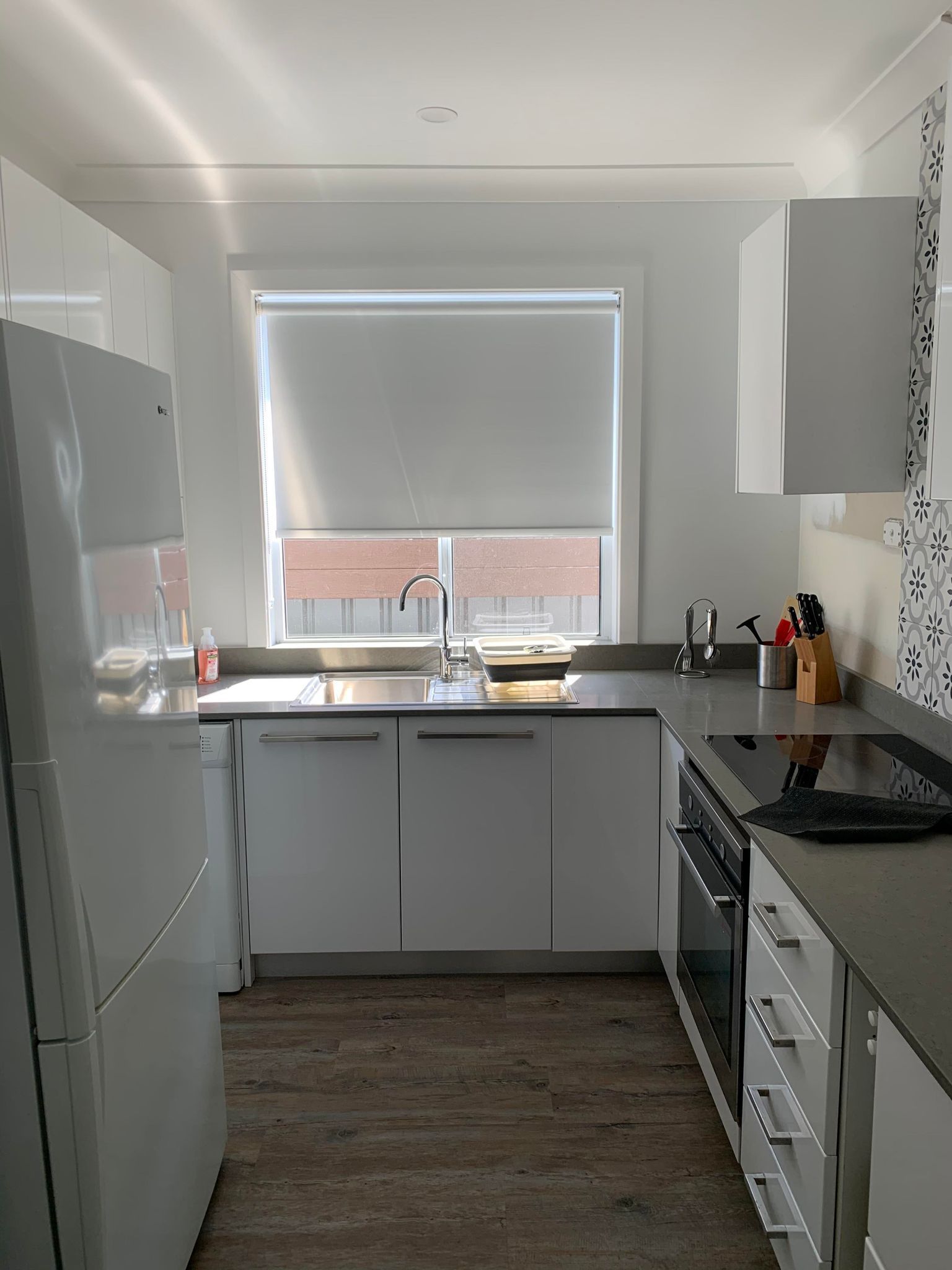 White Kitchen Roller Blinds — Blinds, Awnings & Shutters in Mid North Coast, NSW