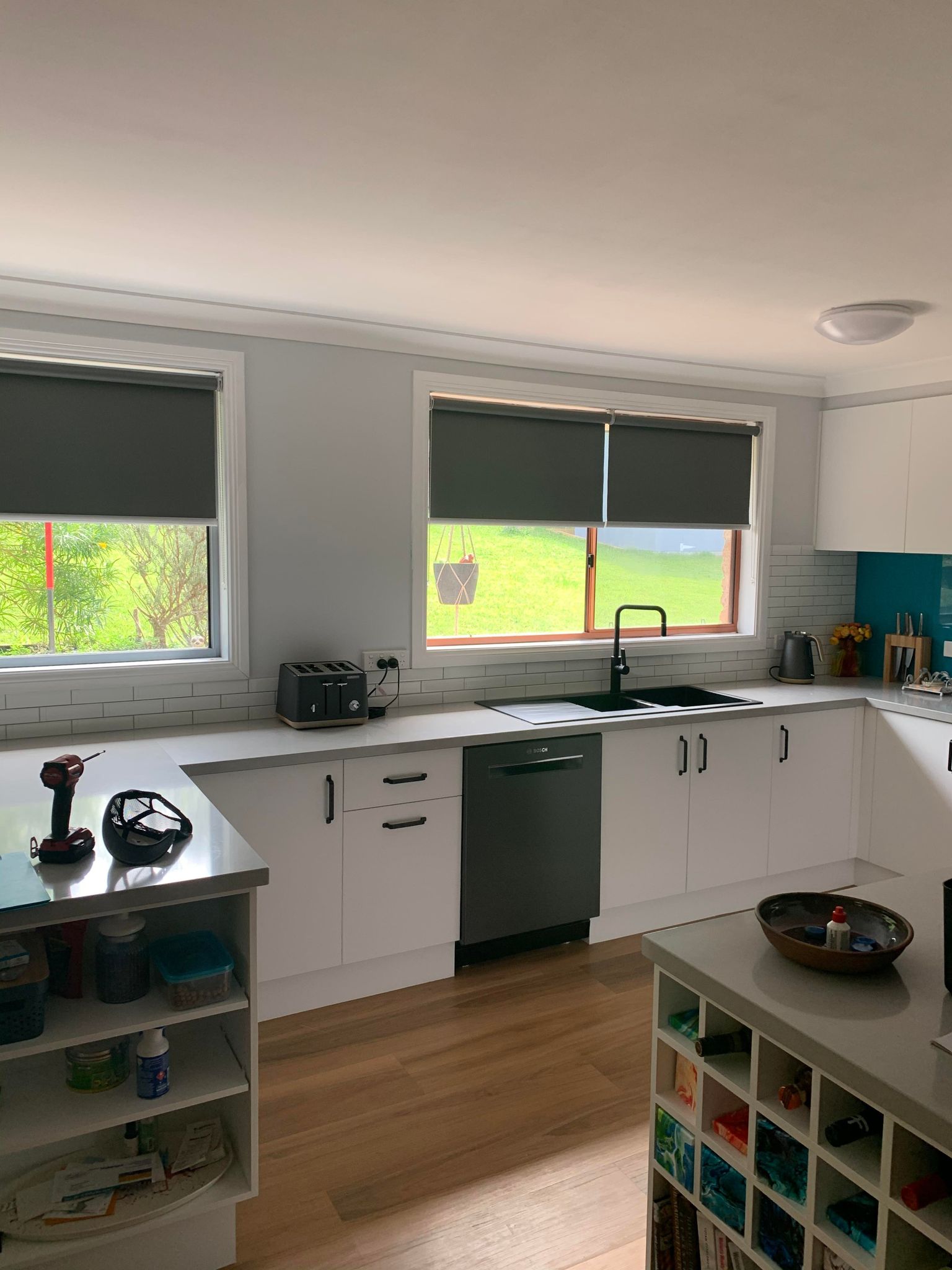 Black Roller Blinds in Kitchen— Blinds, Awnings & Shutters in Mid North Coast, NSW