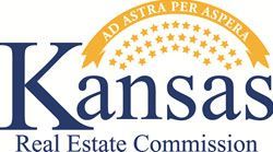 The Kansas Real Estate Commission logo featuring blue text and a yellow banner with stars and the state motto.