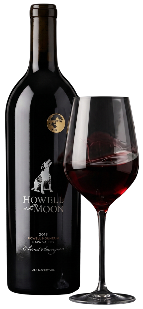 Dark wine bottle beside a filled red wine glass on a white background