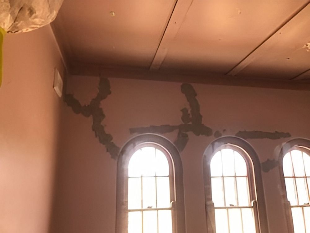 A Room With Arched Windows And A Ceiling That Is Being Painted — L & S Wirth Painting in Dubbo, NSW