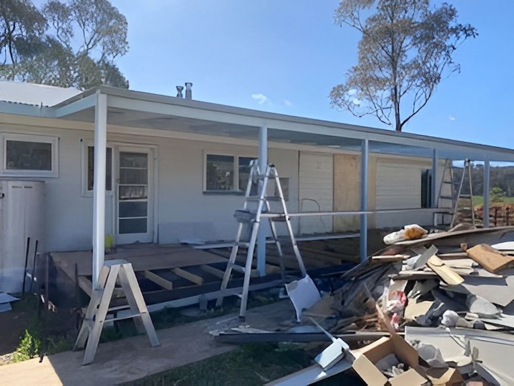 A White House With A Porch And A Ladder In Front Of It — L & S Wirth Painting in Dubbo, NSW