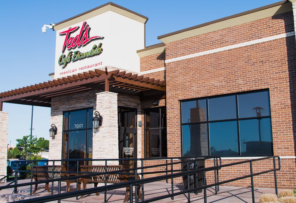 A brick building with a sign that says tod 's