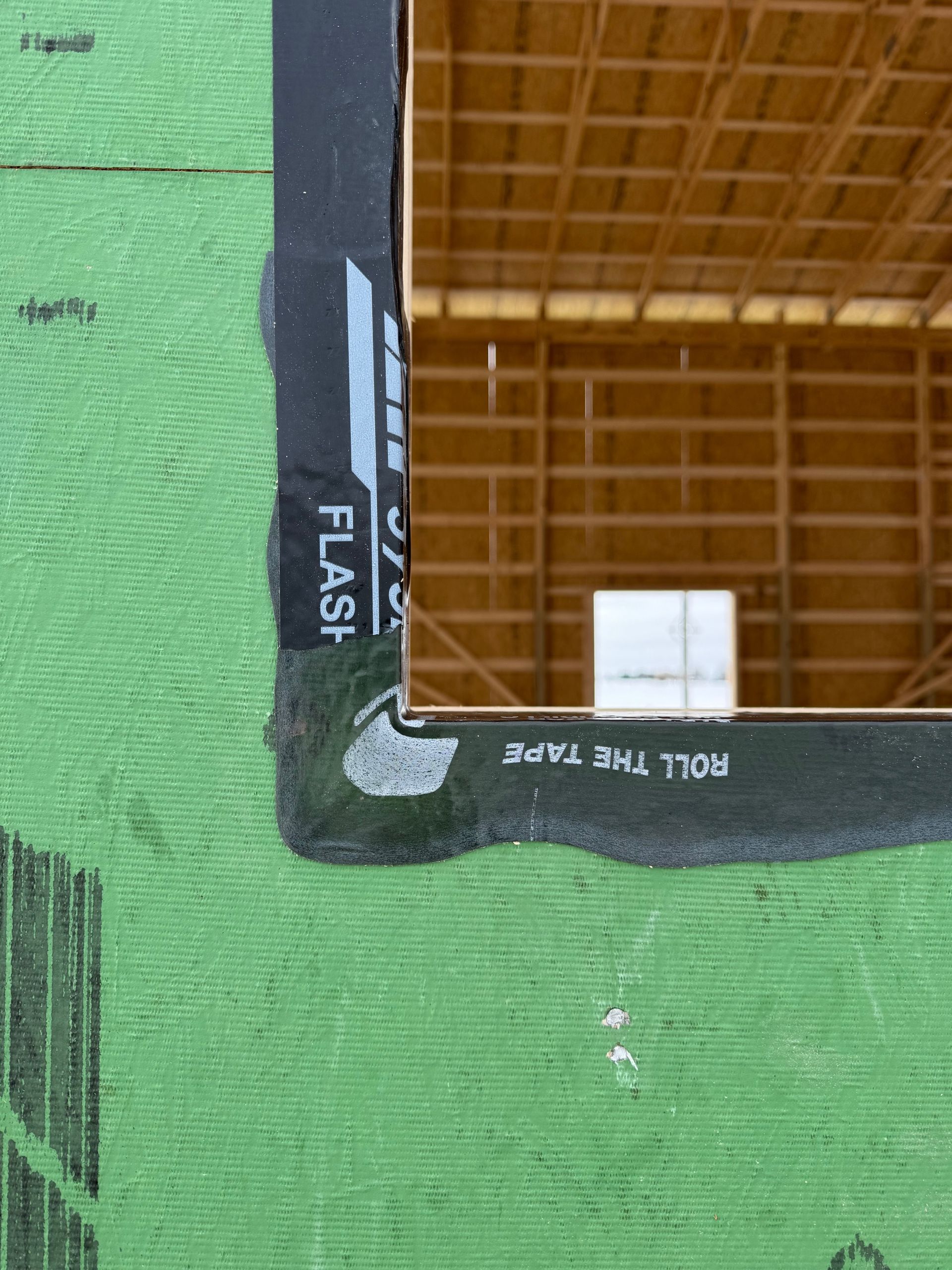 Close-up of a green and black floor plan with a brown grid area labeled “FLAT.”