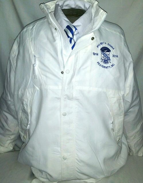 A mannequin is wearing a white jacket and tie