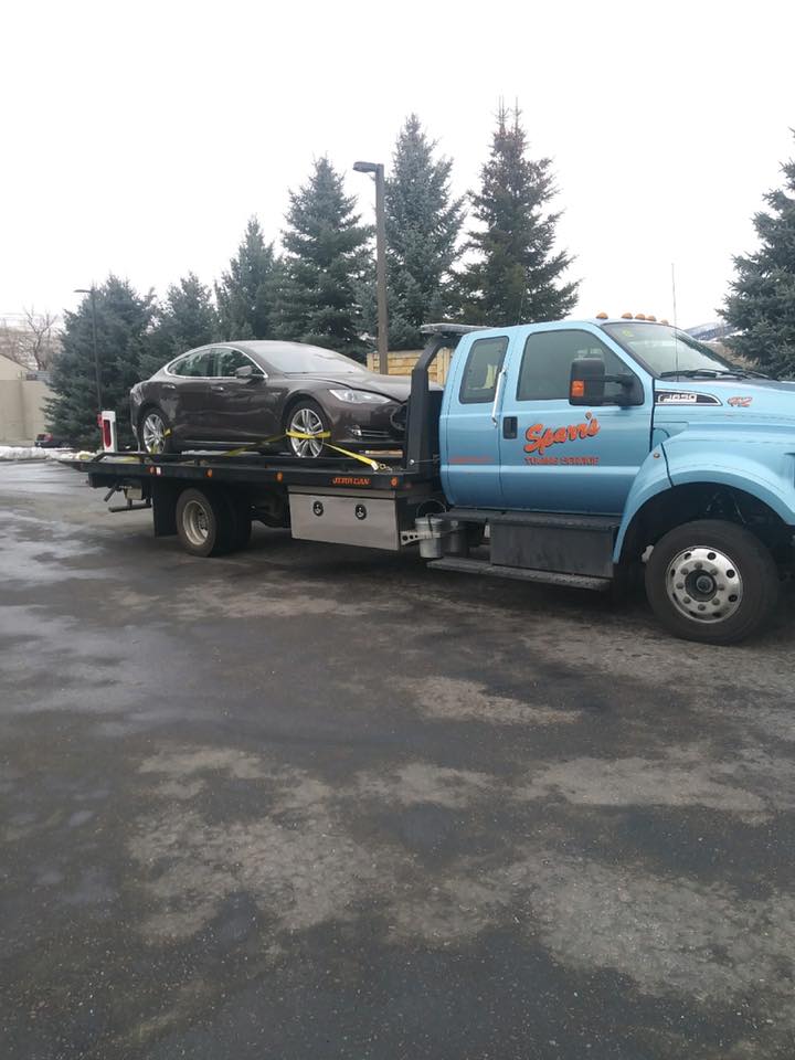 Truck With A Car - Missoula, MT - Sparr’s Towing & Automotive Truck With A Car - Missoula, MT - Sparr’s Towing & Automotive