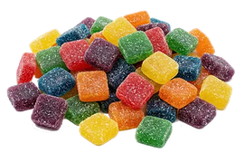Assorted colorful square gummy candies piled together on a white background