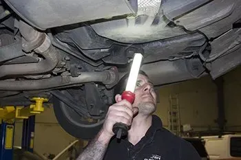 Man-checking-vehicle
