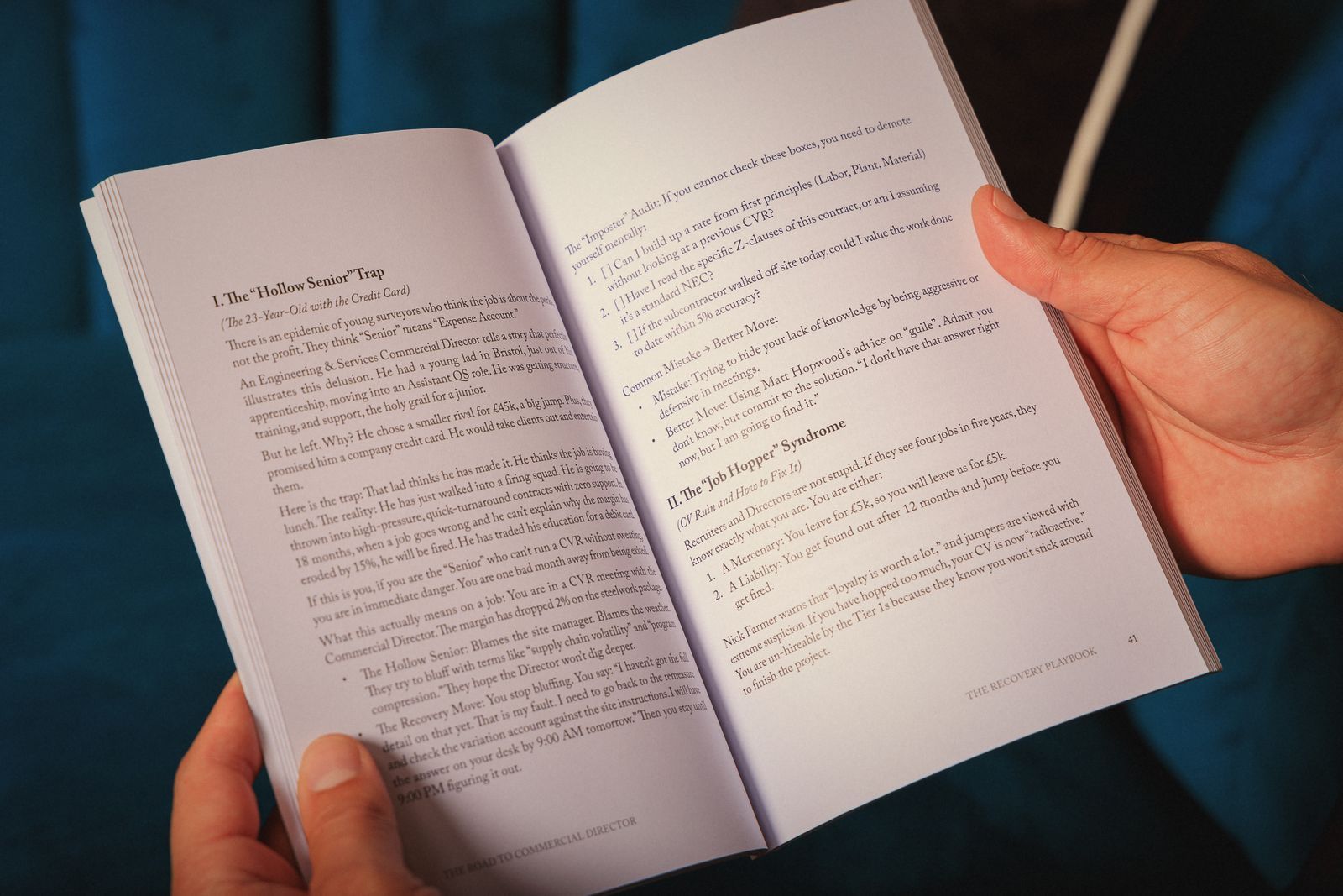 Two copies of The Road to Commercial Director on a wooden side table