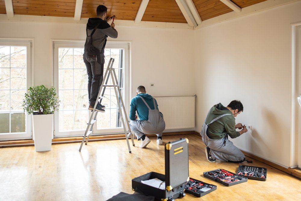 Workers Remodeling the Living Room - Tyrone, PA - Fry’s Construction