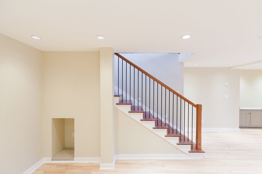 Modern Basement Painted In White Color - Tyrone, PA - Fry’s Construction