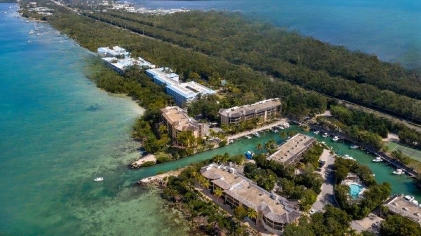 Aerial view of Buttonwood Bay resort in Largo with vibrant waters and lush scenery